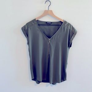 Express green cap sleeve silk shirt with gold accent zipper!